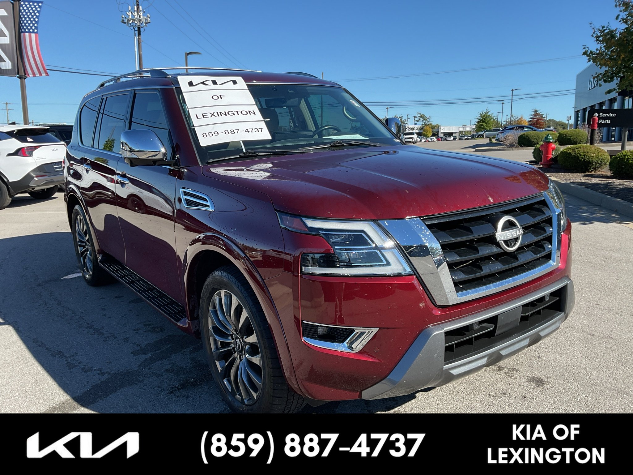 Used 2023 Coulis Red Pearl Nissan Platinum image 1