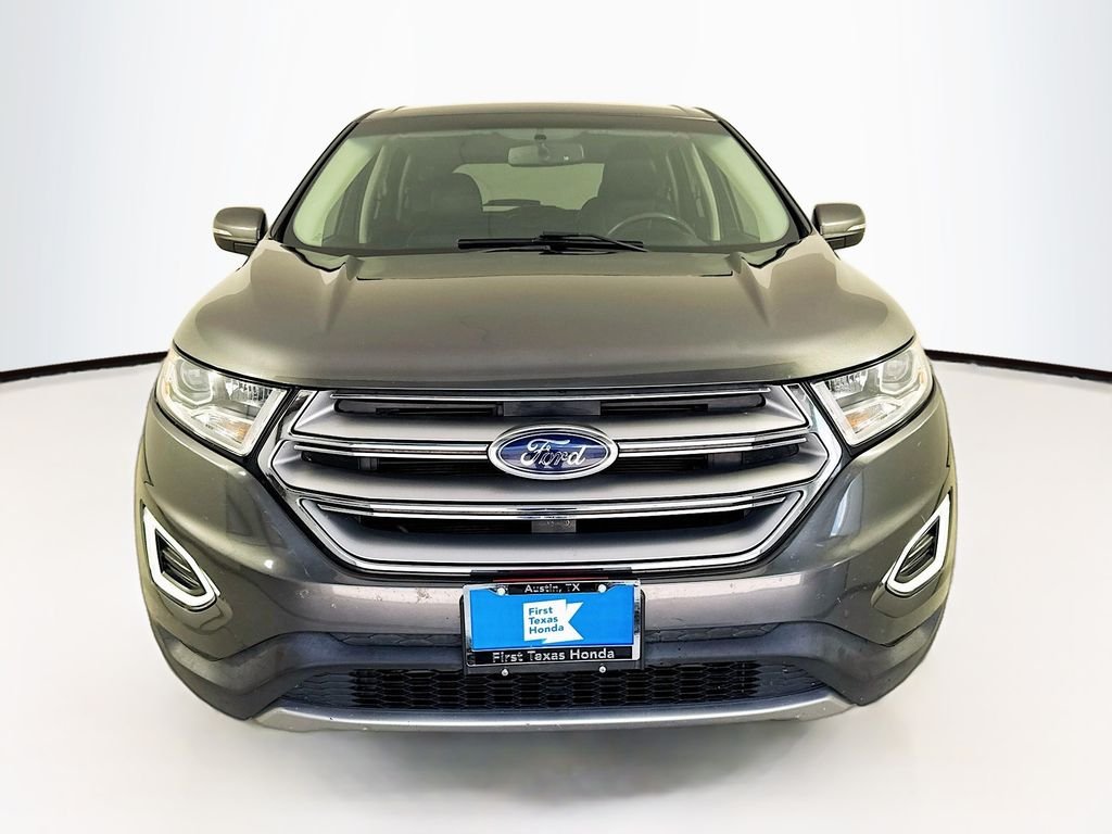 Used 2016 Gray Metallic Ford Titanium image 2