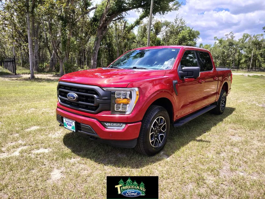 Used 2021 Red Ford XLT 4X4 CREW 5.0 image 1