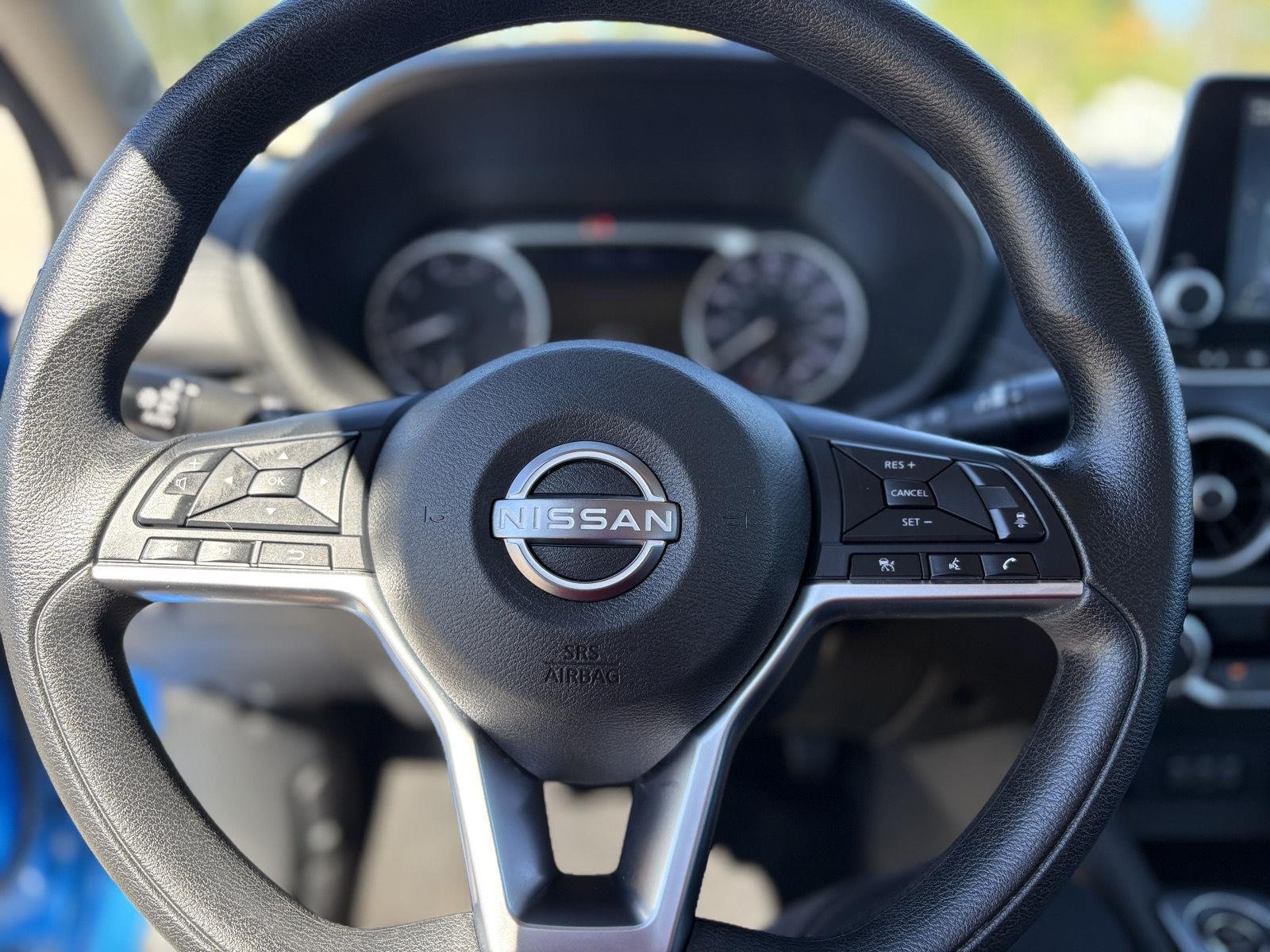 Used 2025 Electric Blue Metallic Nissan SV image 25