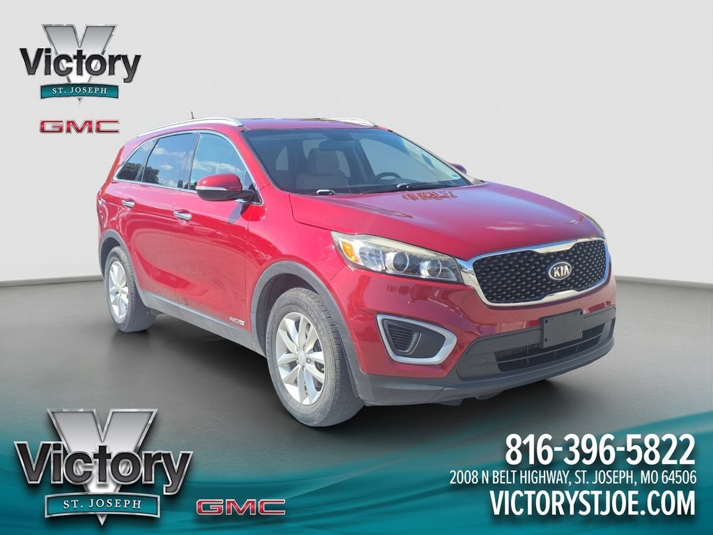 Used 2017 Red Kia 3.3L LX image 1