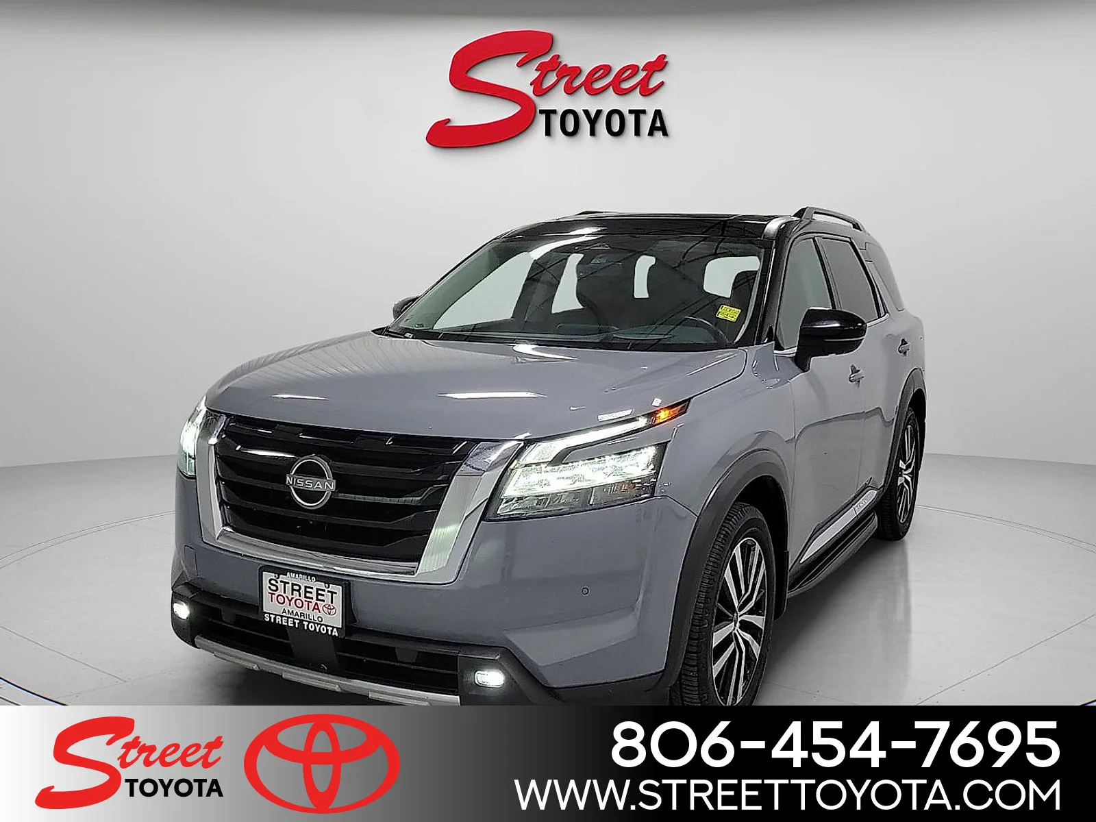 Used 2024 Solid Gray/Super Black Nissan Platinum image 1