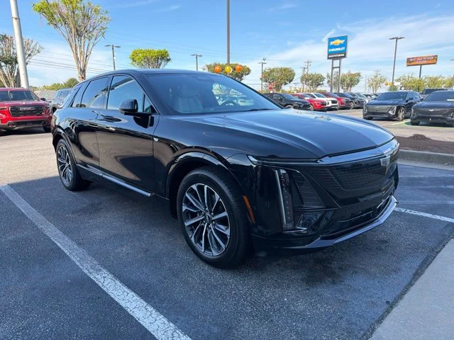 Used 2024 Stellar Black Metallic Cadillac Sport 1 image 1