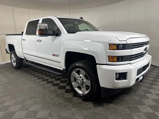 Used 2016 White Chevrolet LTZ image 1