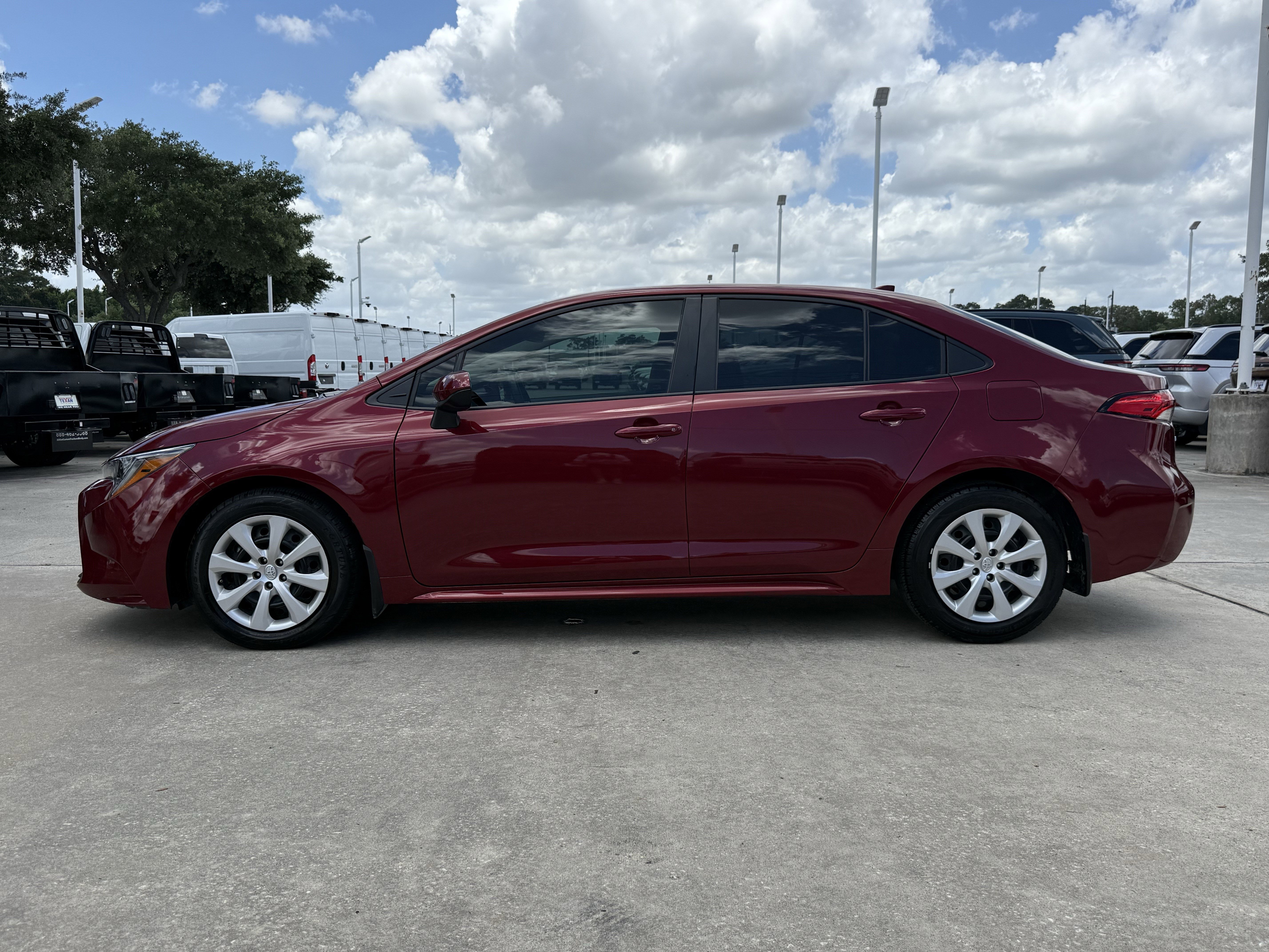 Used 2025 Pearl Toyota LE image 7