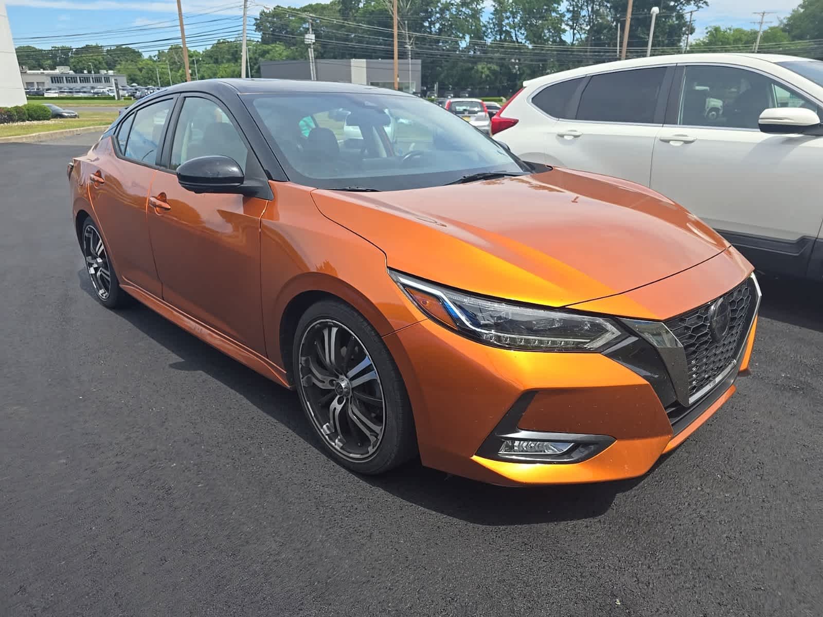 Used 2023 Monarch Orange Metallic/Super Black Nissan SR image 3