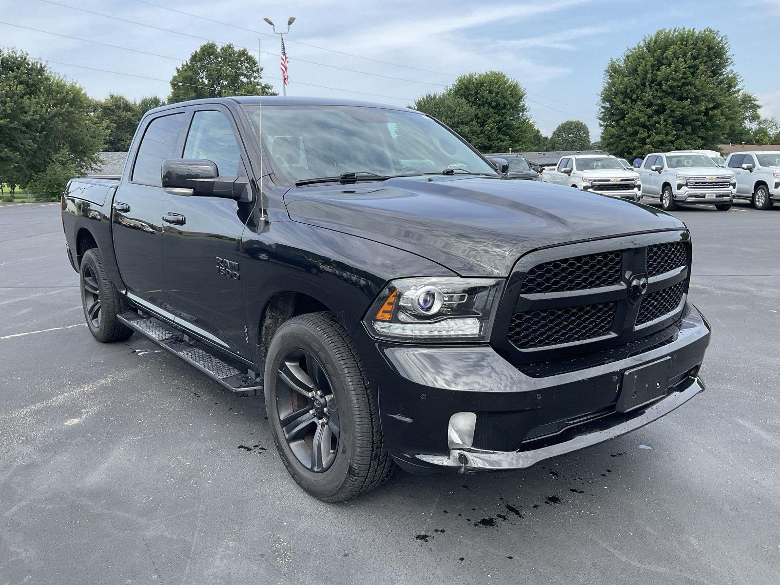 Used 2018 Brilliant Black Crystal Pearlcoat Ram Night image 3