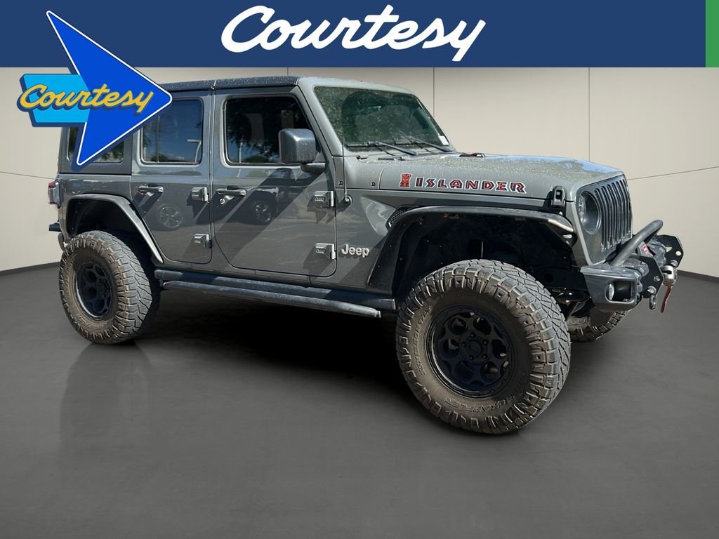 Used 2021 Gray Jeep Unlimited Sport image 1