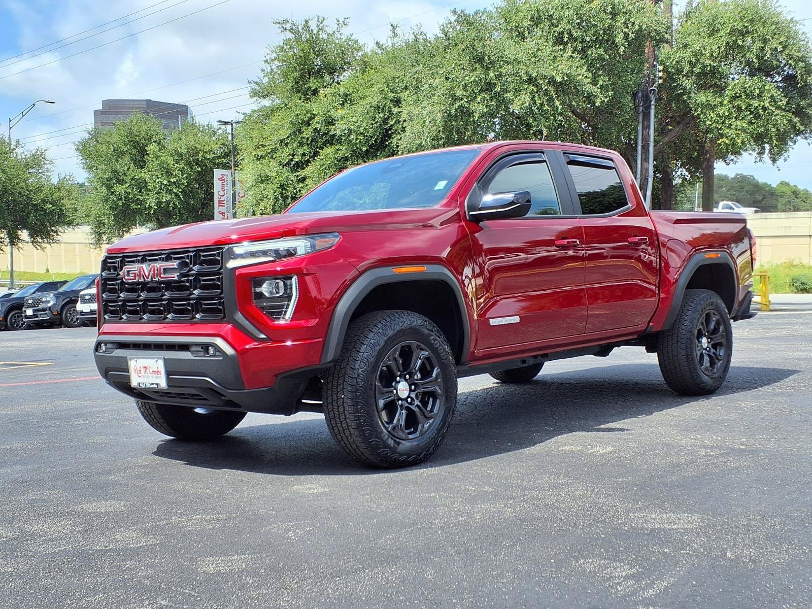 Used 2024 Volcanic Red Tintcoat GMC 2WD Elevation image 1