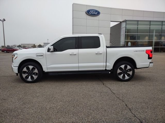 Used 2022 Ford F-150 Lightning Platinum with VIN 1FT6W1EV6NWG07267 for sale in Galesburg, IL
