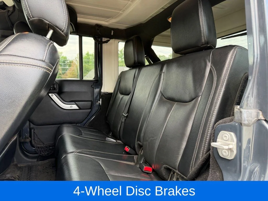 Used 2017 Black Jeep Unlimited Sahara image 19