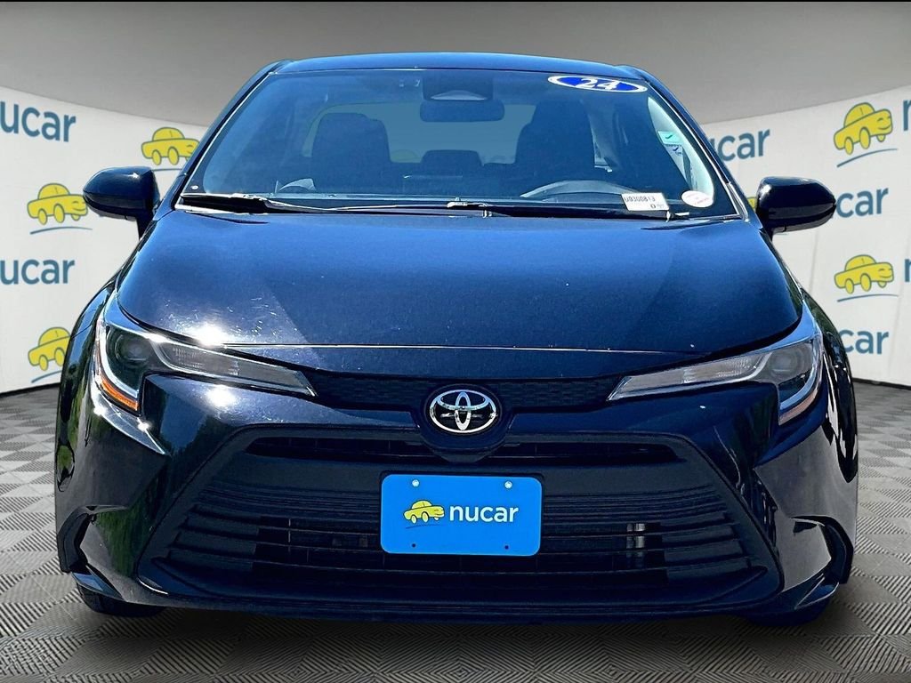 Used 2024 Black Toyota LE image 2