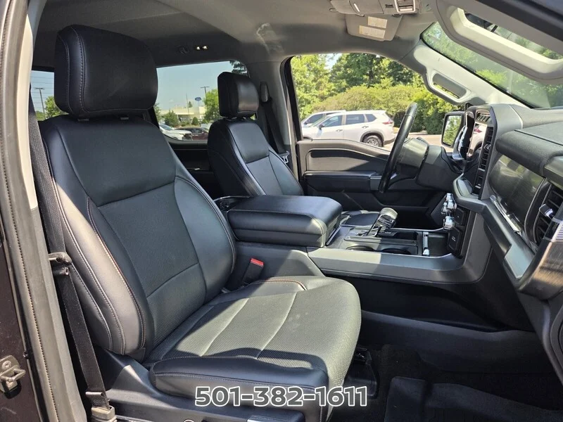Used 2021 Black Metallic FORD LARIAT 4WD SUPERCREW 5.5
