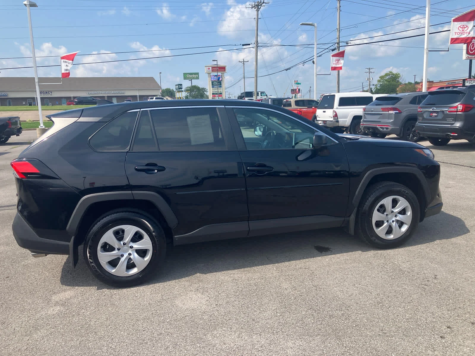 Certified Used 2025 Midnight Black Metallic Toyota LE image 10
