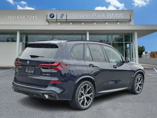 New 2026 Carbon Black Metallic BMW xDrive50e image 4