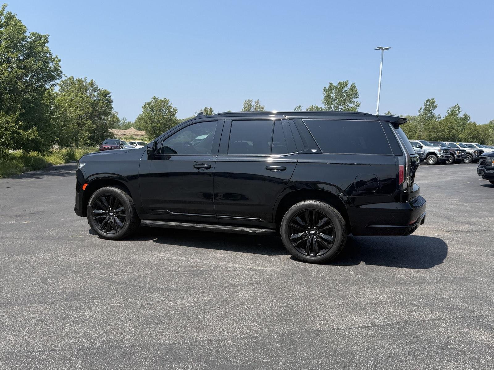 Used 2023 Black Raven Cadillac 4WD Sport image 6