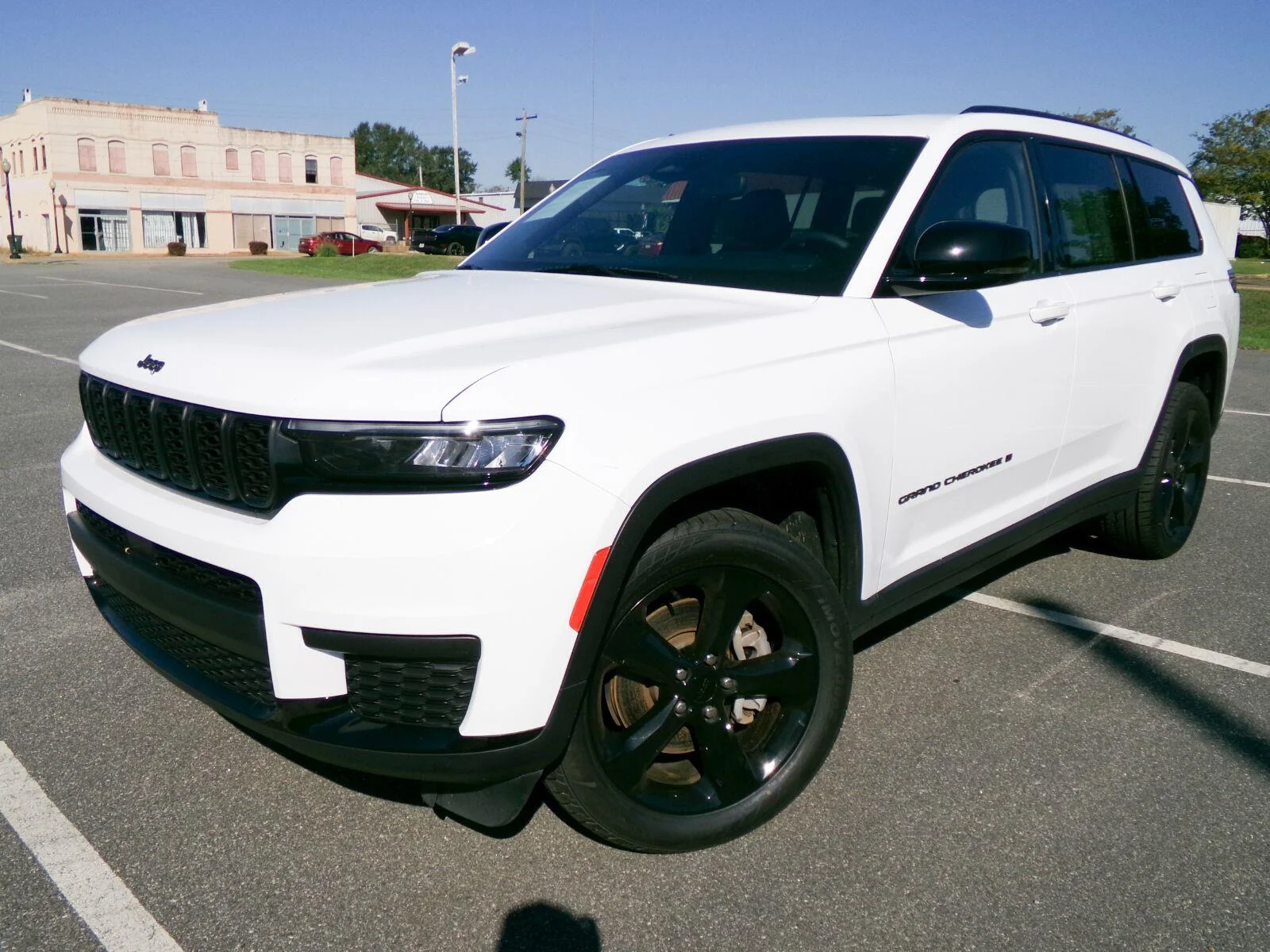 Used 2023 Bright White Clearcoat Jeep Altitude image 1