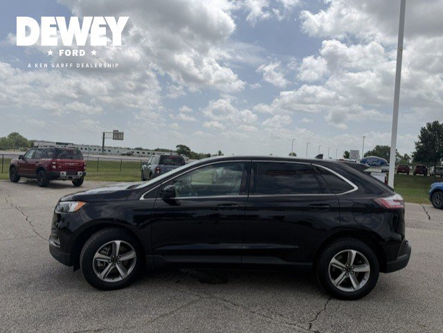 Used 2024 Black Metallic Ford SEL image 4