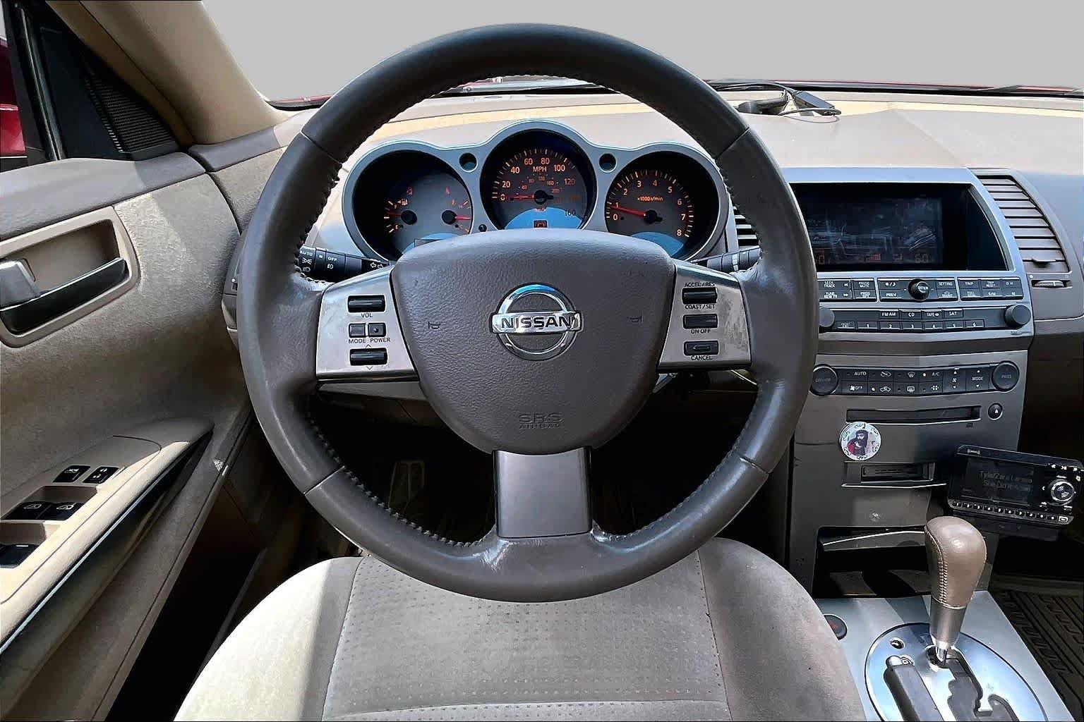 Used 2004 Red Opulence Metallic Nissan SE image 5