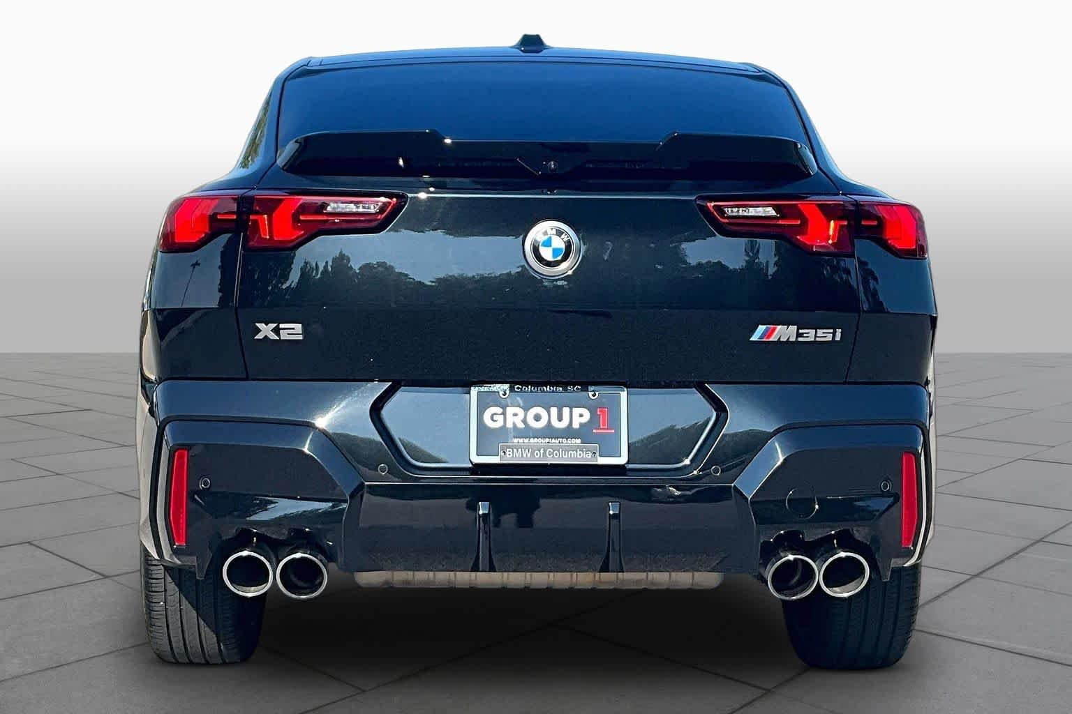 Certified Used 2024 Black Sapphire Metallic BMW M35i image 4