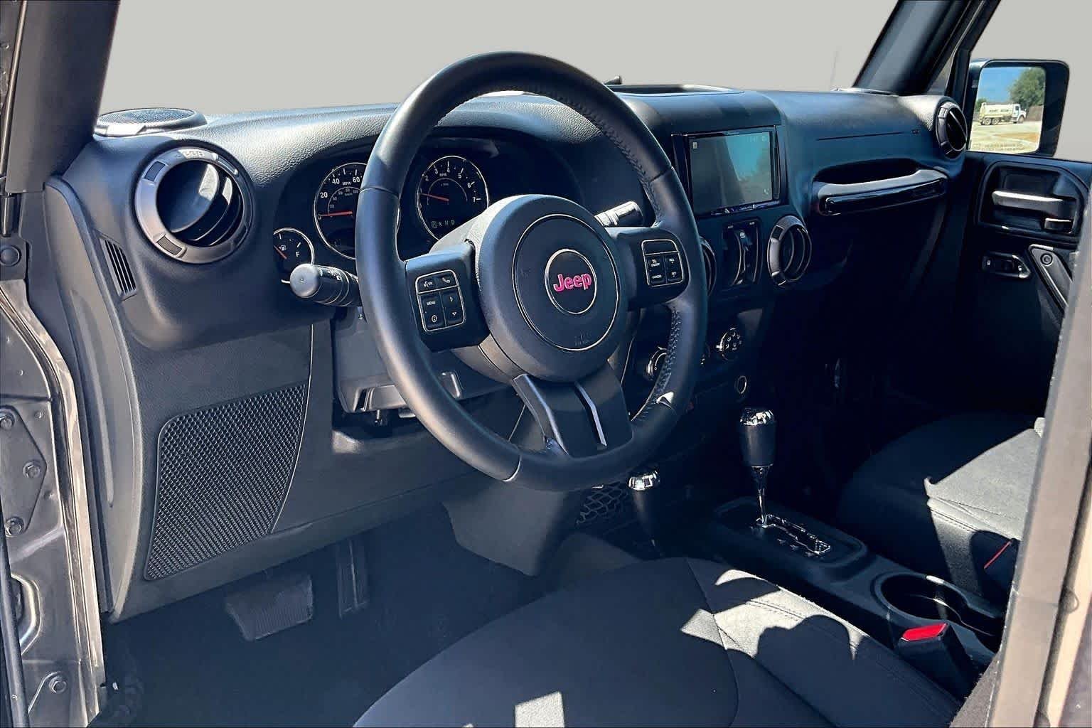 Used 2018 Granite Crystal Metallic Clearcoat Jeep Sport S image 15