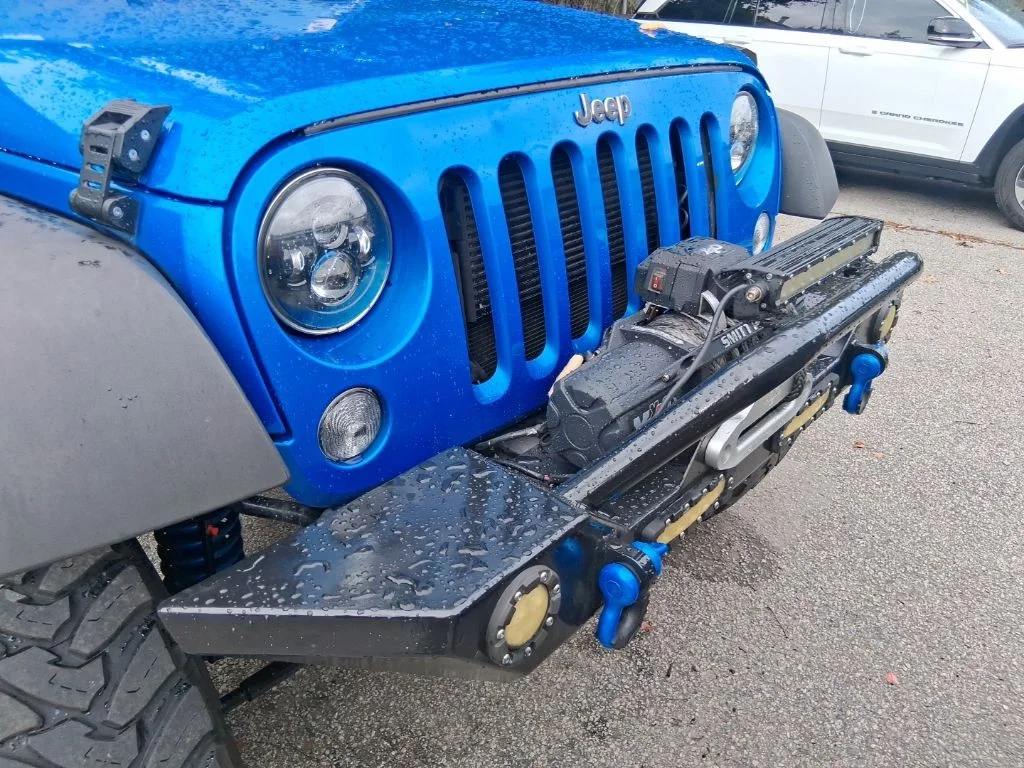 Used 2015 Blue Jeep Unlimited Sport image 8