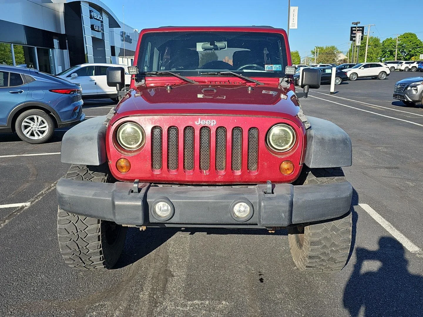 Used 2011 Deep Cherry Red Crystal Pearlcoat Jeep Sport image 5