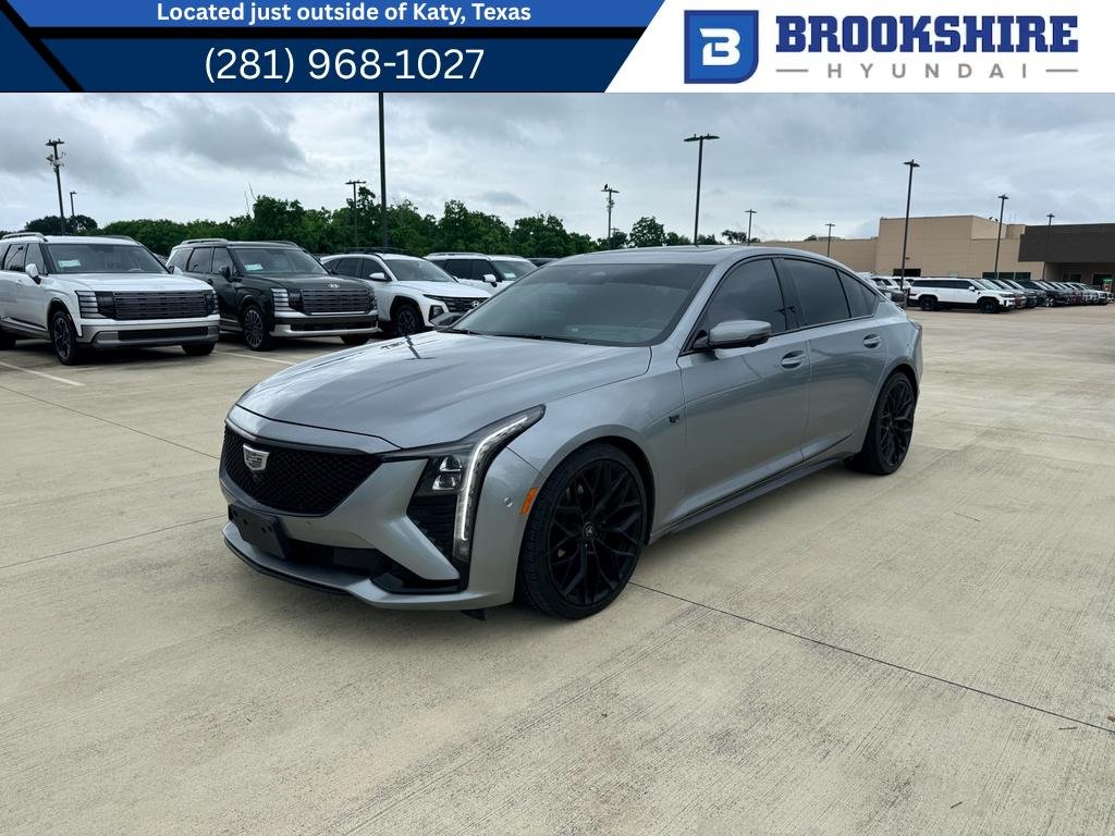 Used 2025 Argent Silver Metallic Cadillac Sport image 1