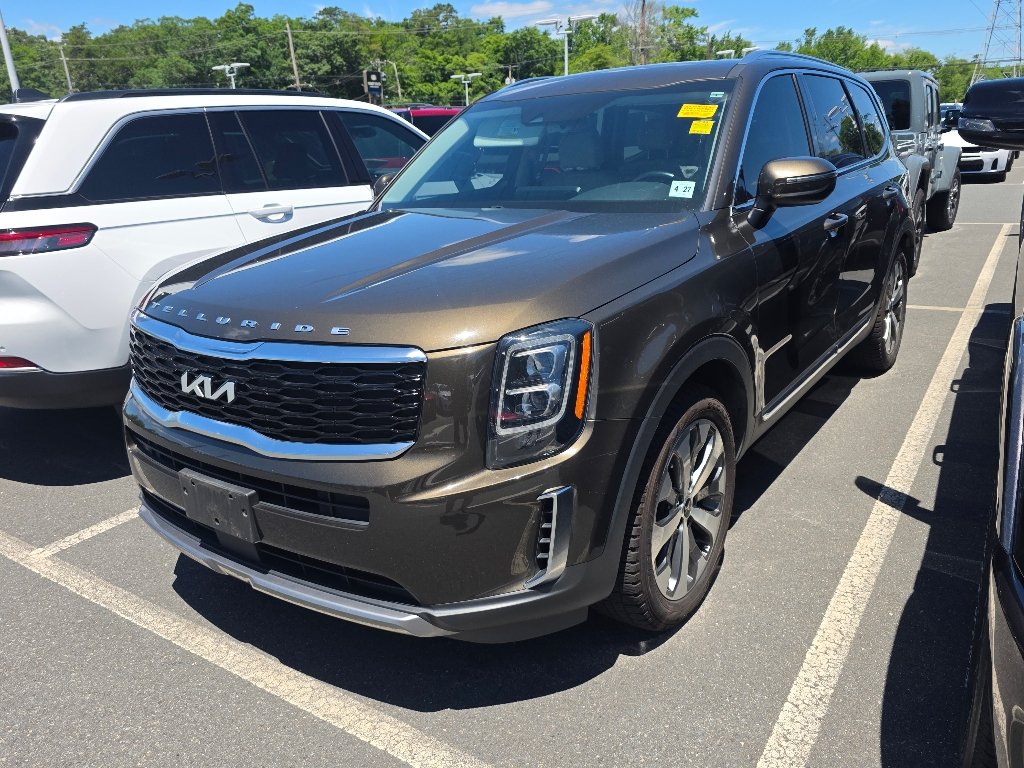 Used 2022 Dark Moss Kia EX image 1