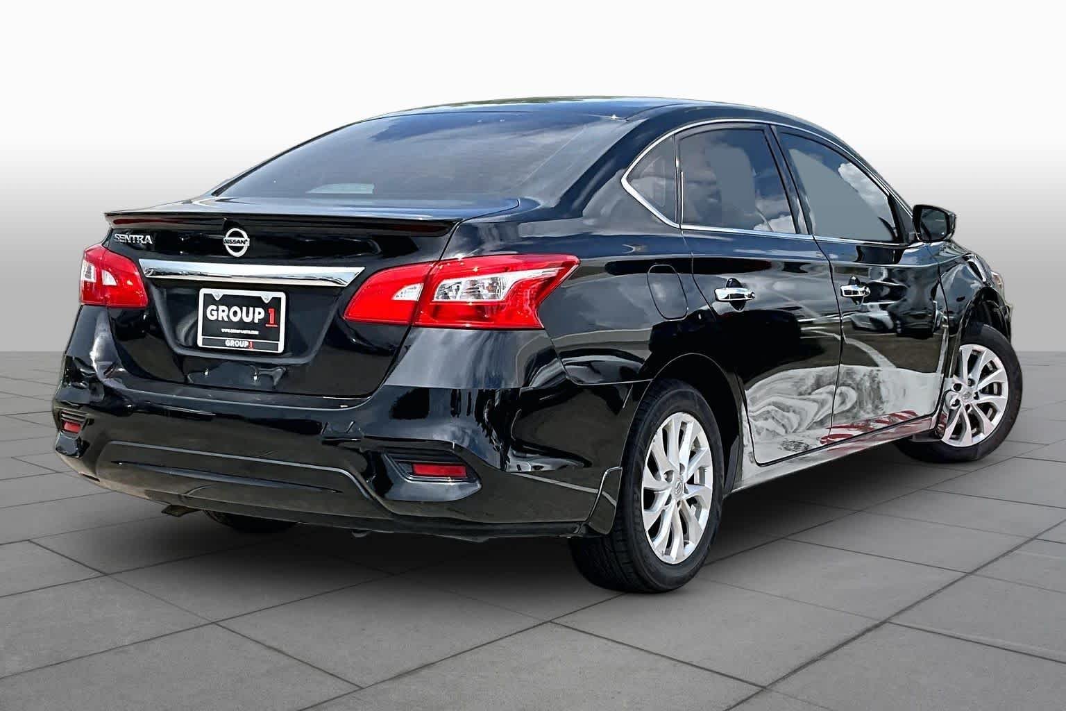 Used 2017 Super Black Nissan S image 11