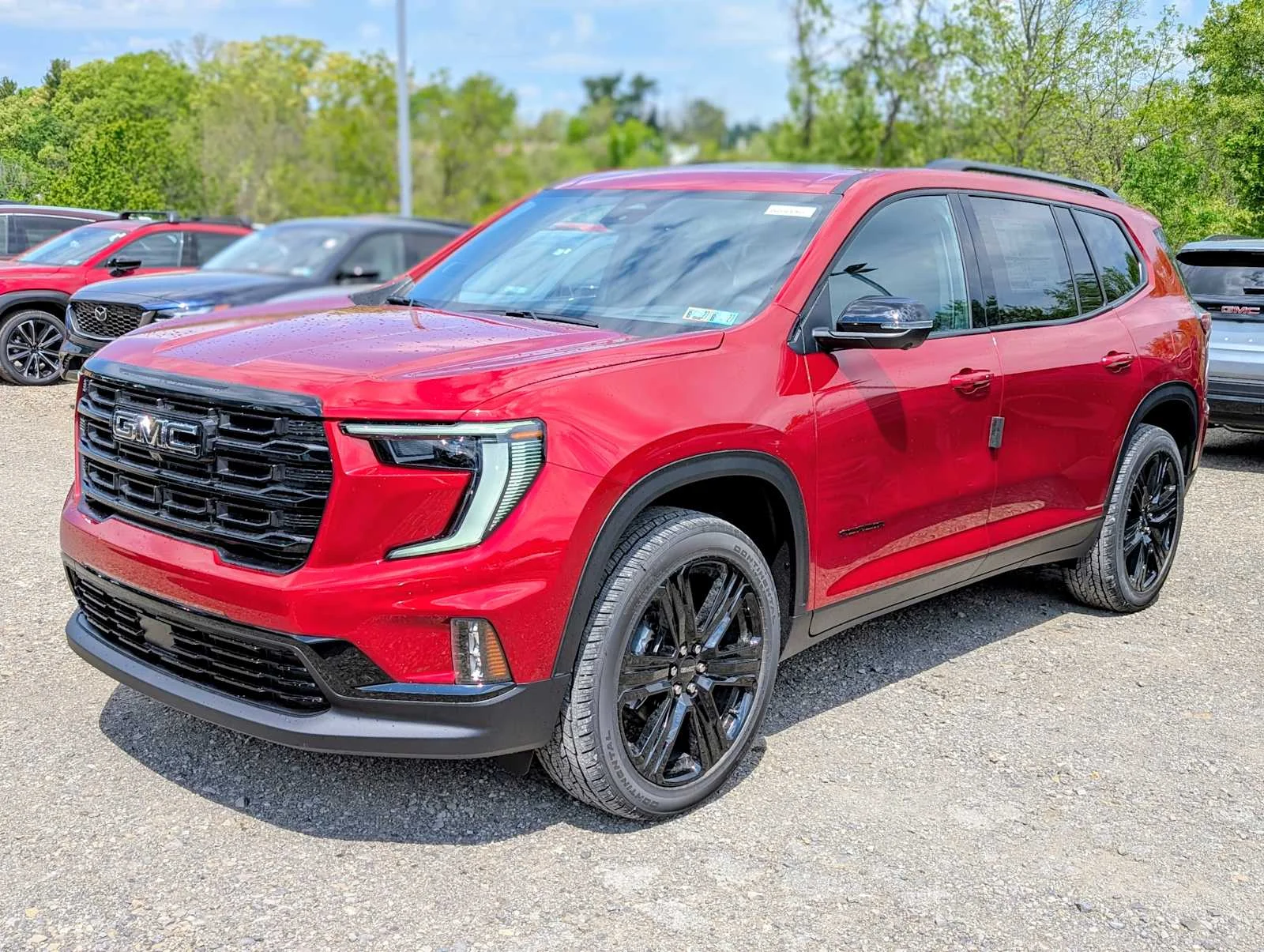 New 2026 Volcanic Red Tintcoat GMC Elevation image 1