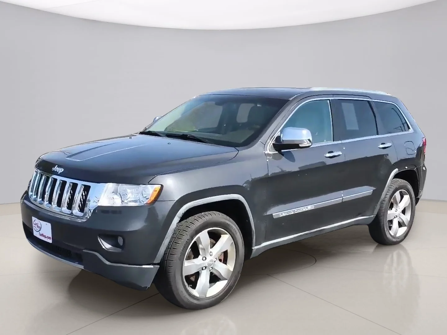 Used 2011 Grey Jeep OVERLAND image 1