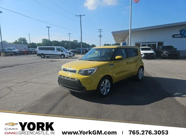 Used 2015 Yellow Kia Plus image 1