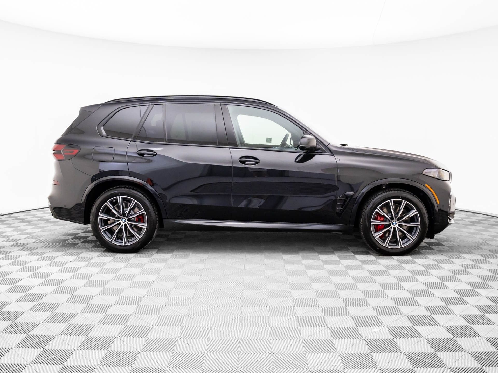 New 2026 Black Sapphire Metallic BMW xDrive50e image 7