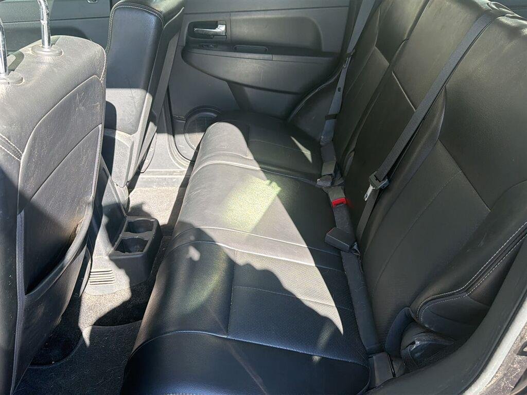 Used 2012 Brilliant Black Crystal Pearl Jeep Sport Latitude image 12