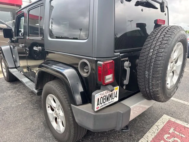 Used 2013 Black Jeep Unlimited Sahara image 8