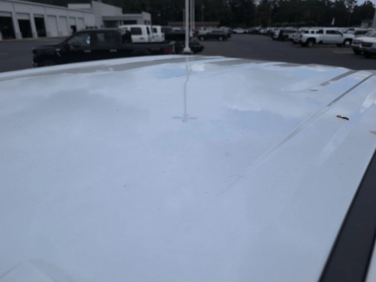 New 2026 Glacier White Tricoat GMC SLT image 14