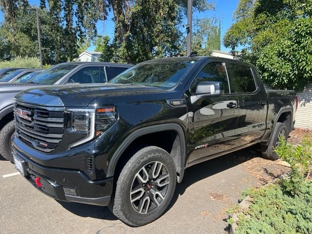 Used 2023 Black GMC AT4 image 1