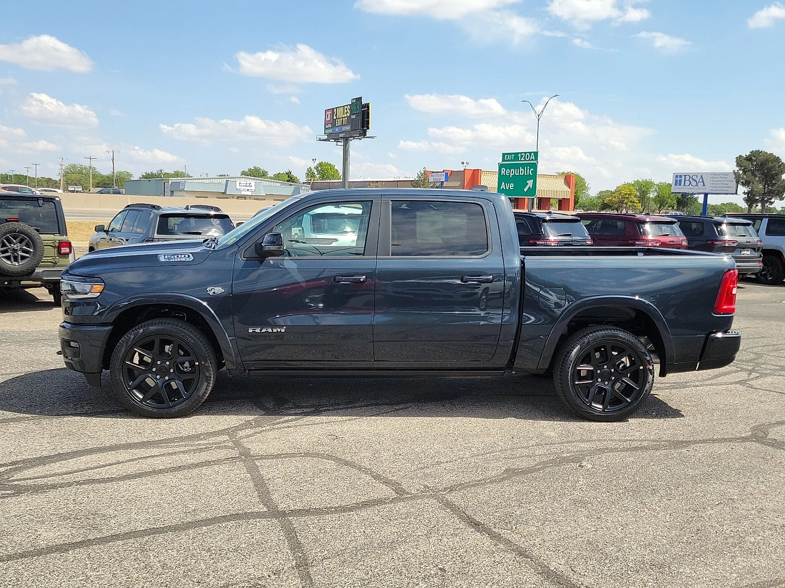 New 2026 Forged Blue Ram LARAMIE CREW CAB 4X4 5