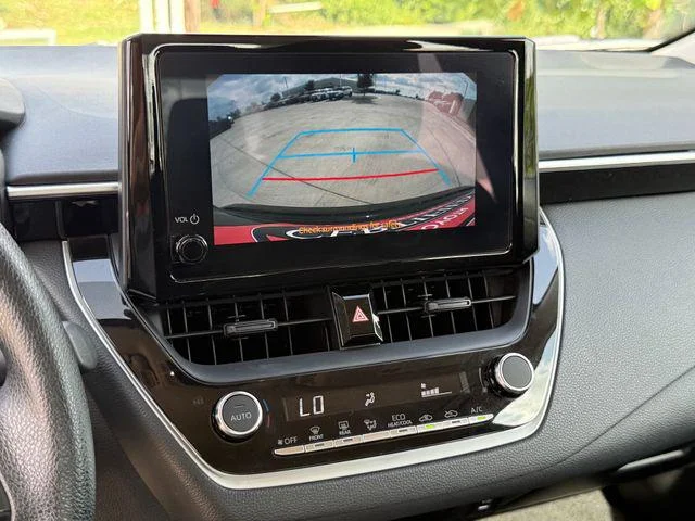 Certified Used 2024 MIDNIGHT BLACK METAL Toyota LE image 19