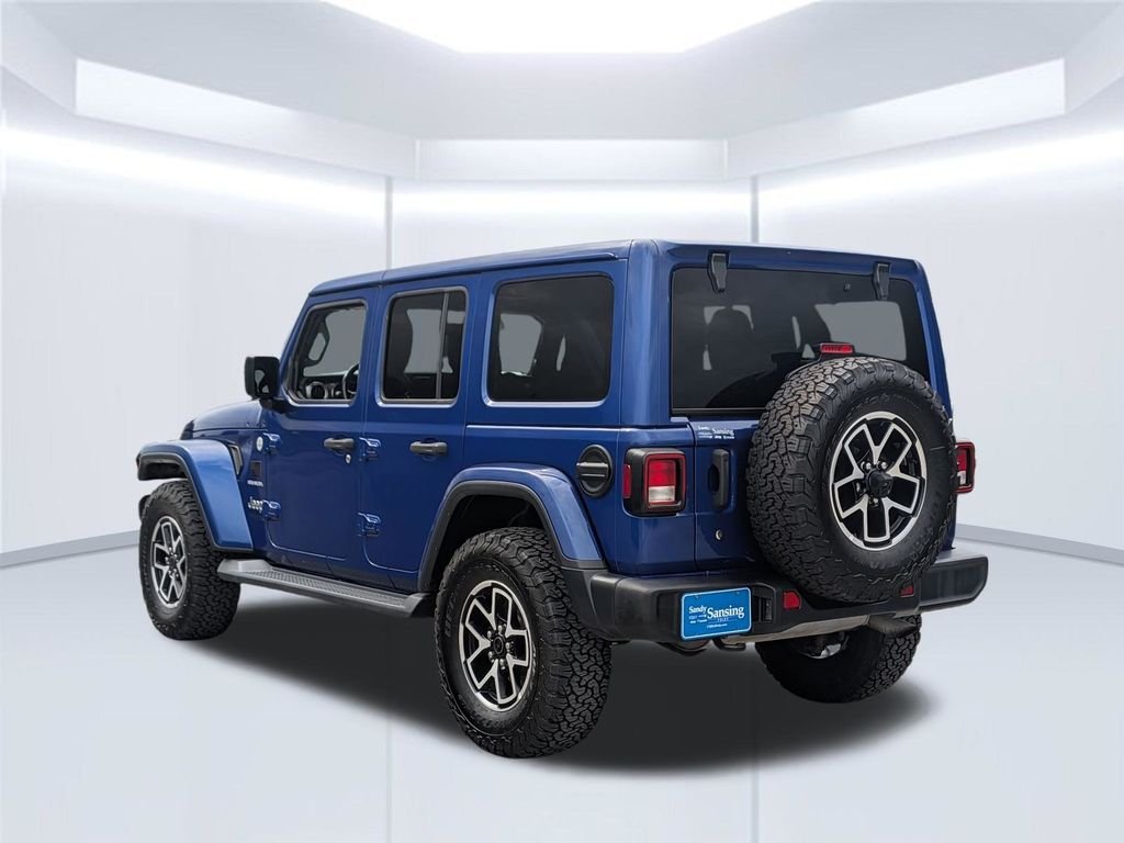 Used 2019 Blue Jeep Unlimited Sahara image 3