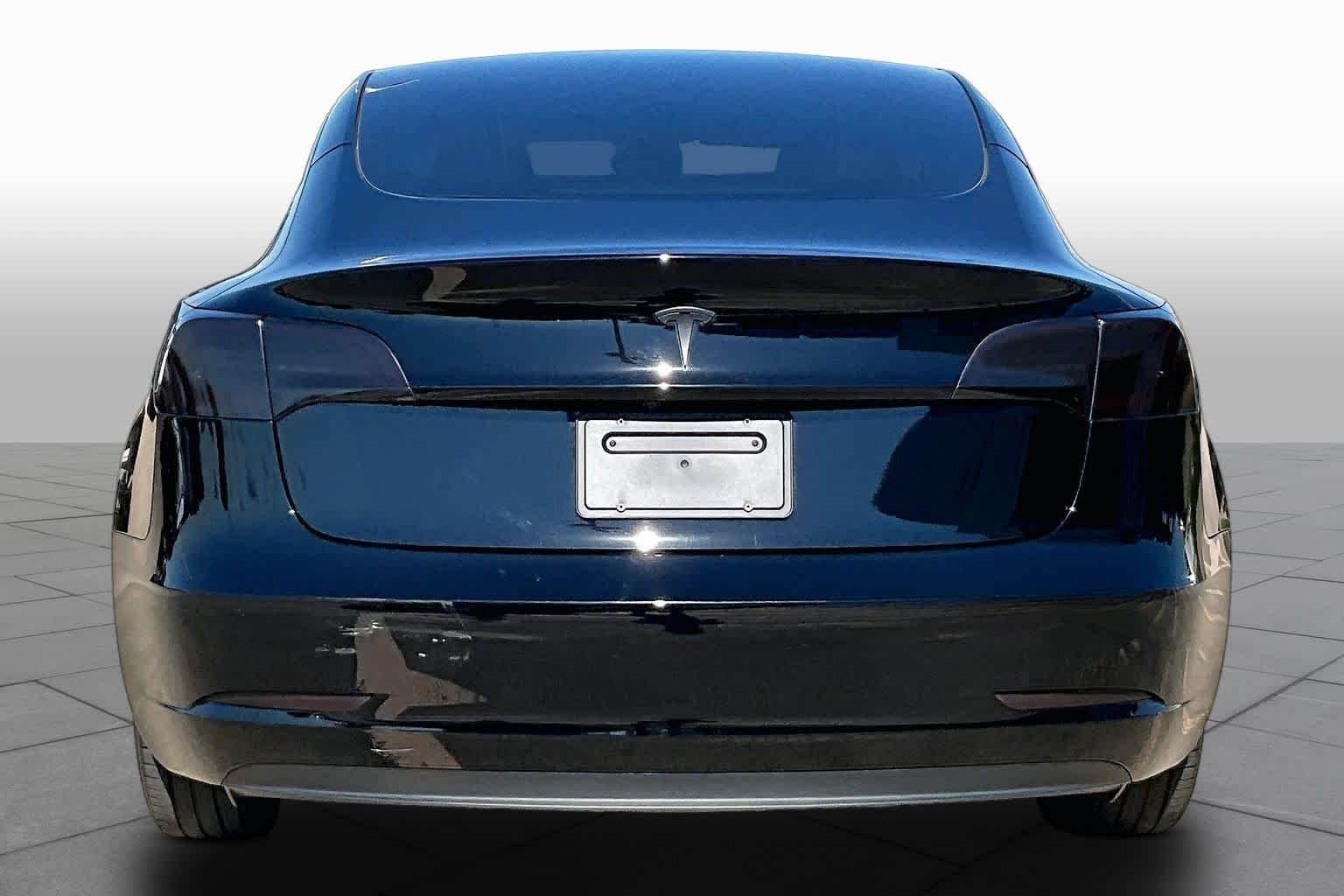 Used 2023 Solid Black Tesla  image 4