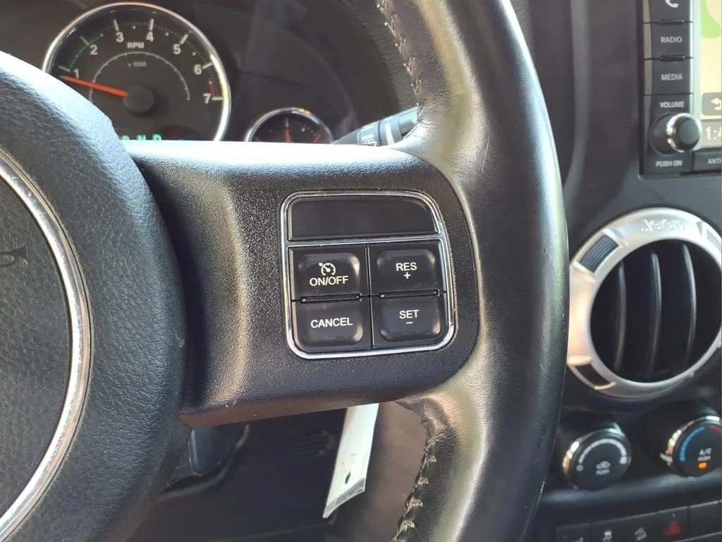 Used 2017 Silver Jeep Unlimited Sahara image 14