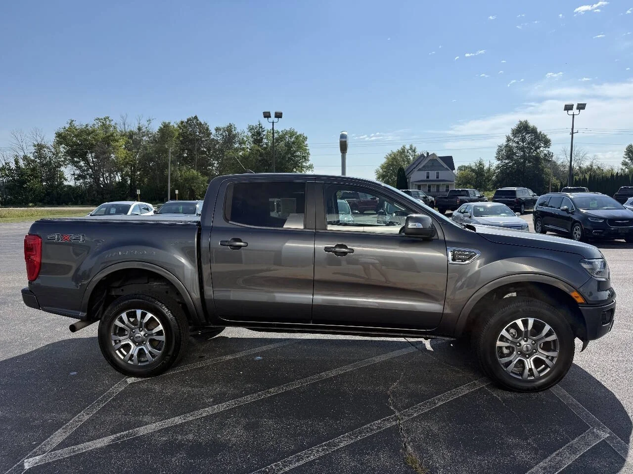 Used 2020 Magnetic Ford Lariat 4x4 4dr SuperCrew 5.1 ft. SB image 4