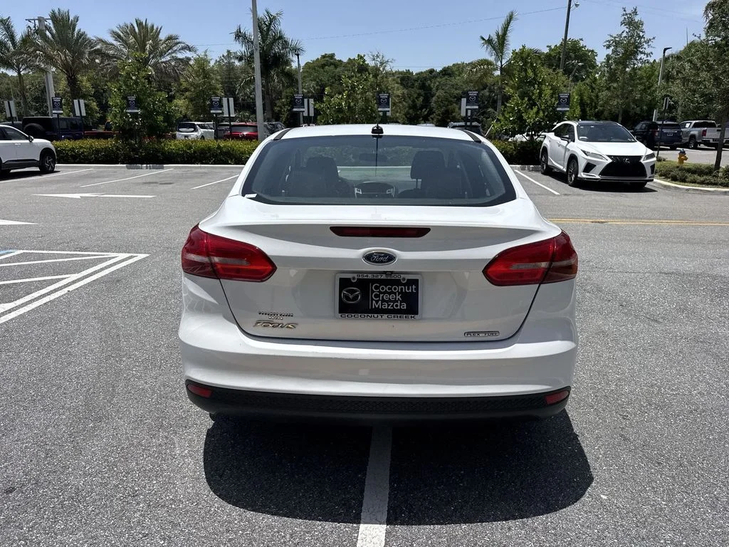 Used 2015 Ford Focus S with VIN 1FADP3E20FL365980 for sale in Coconut Creek, FL