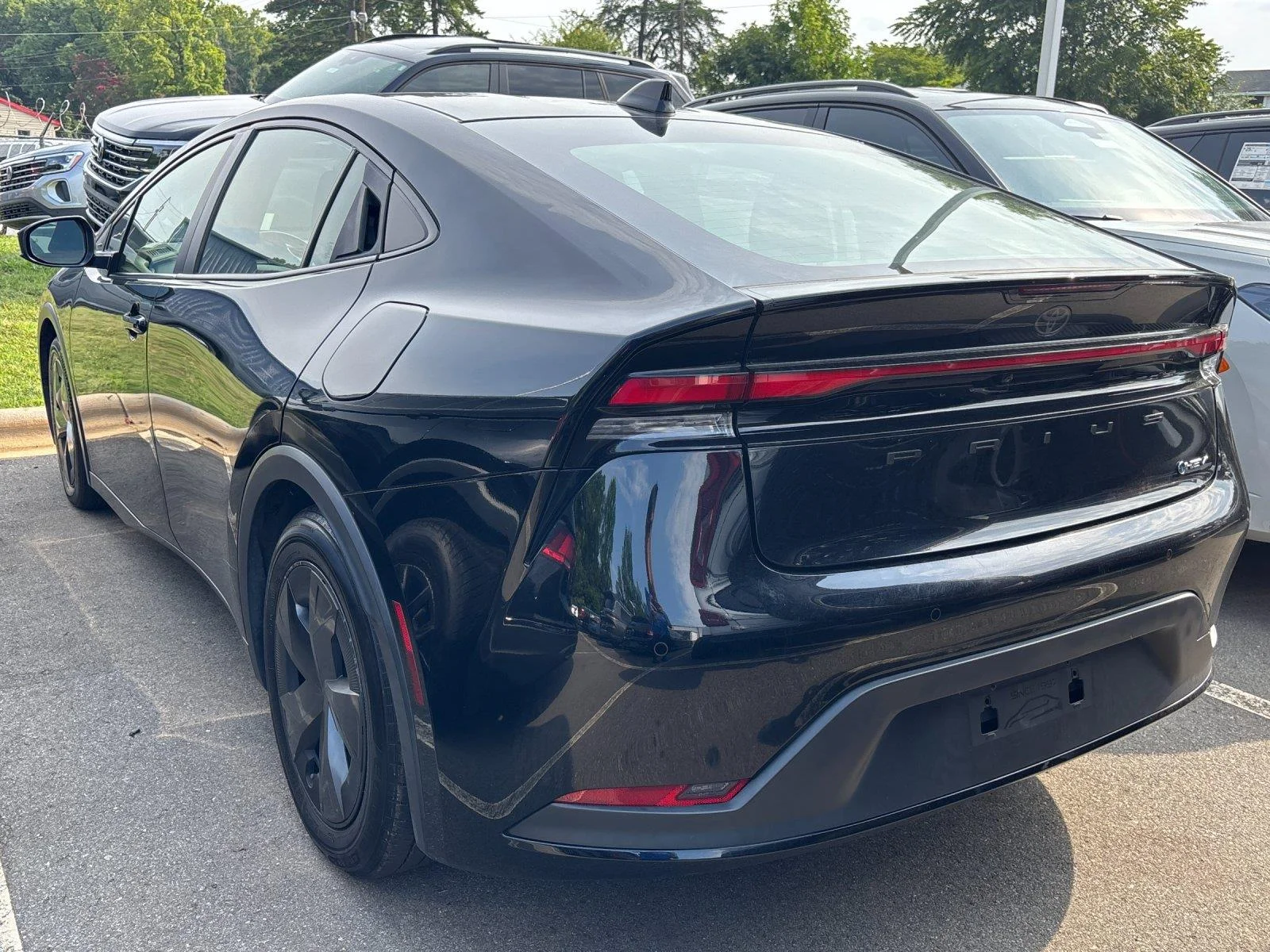 Used 2023 Midnight Black Metallic Toyota LE image 3
