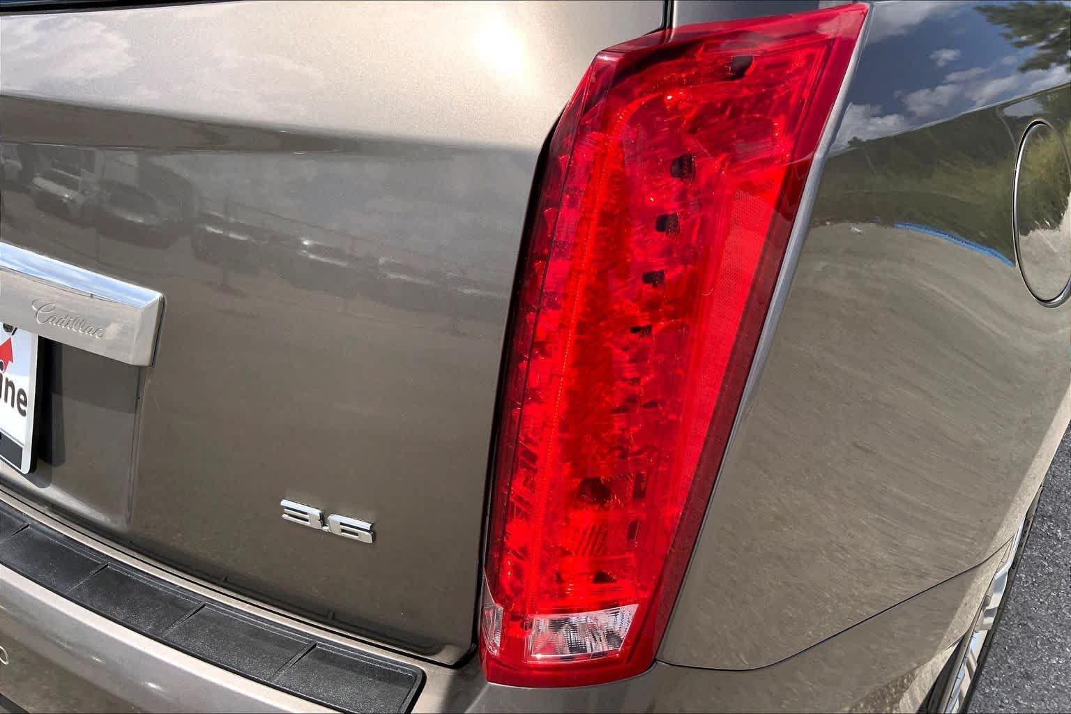 Used 2012 Mocha Steel Metallic Cadillac Luxury Collection image 30