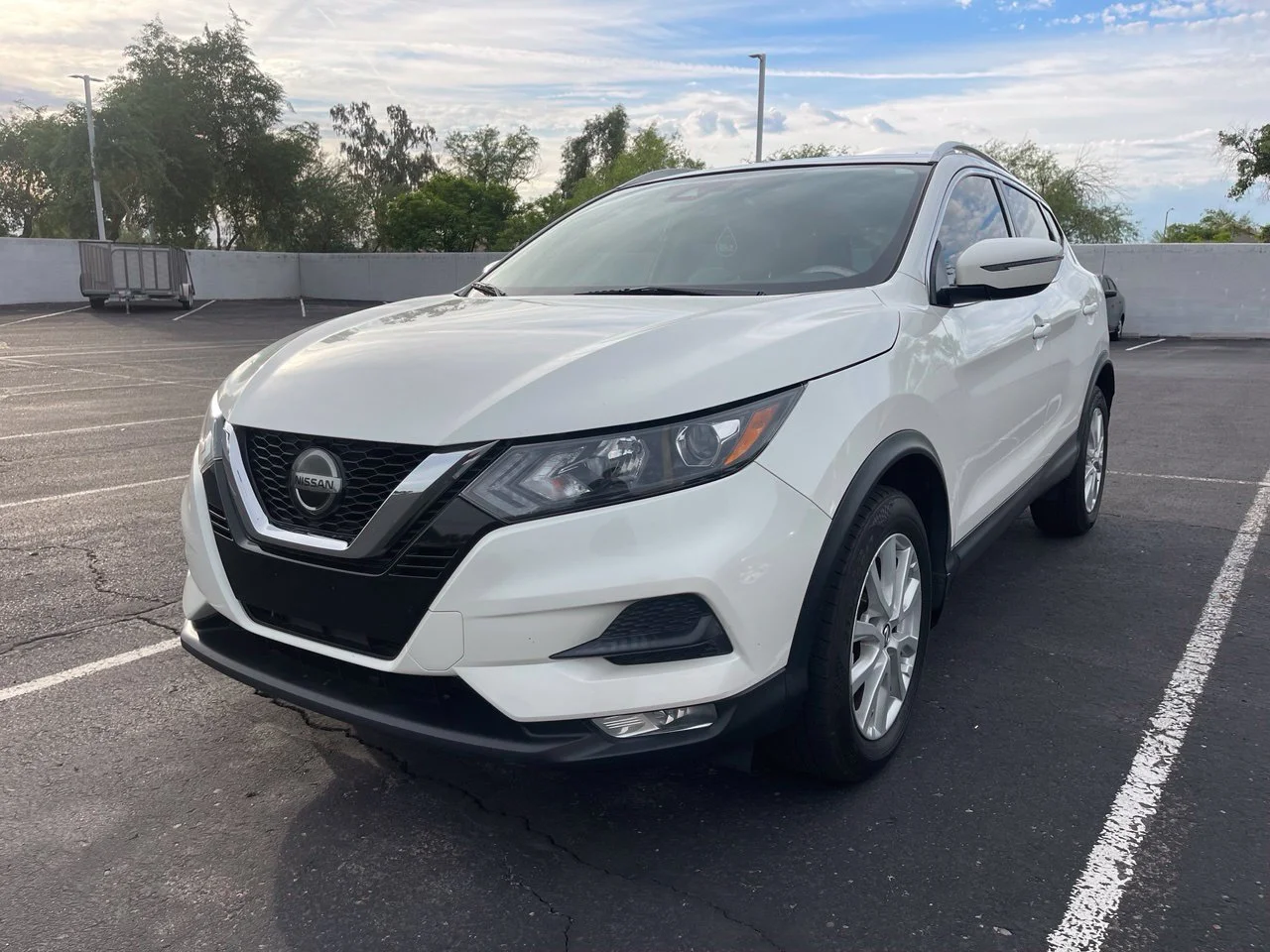 Used 2021 Pearl White Tricoat Nissan SV image 1