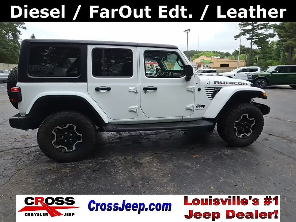 Used 2023 Bright White Clearcoat Jeep Rubicon image 1