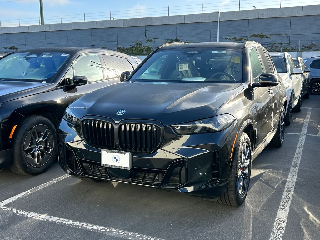 New 2026 Black Sapphire Metallic BMW xDrive50e image 2